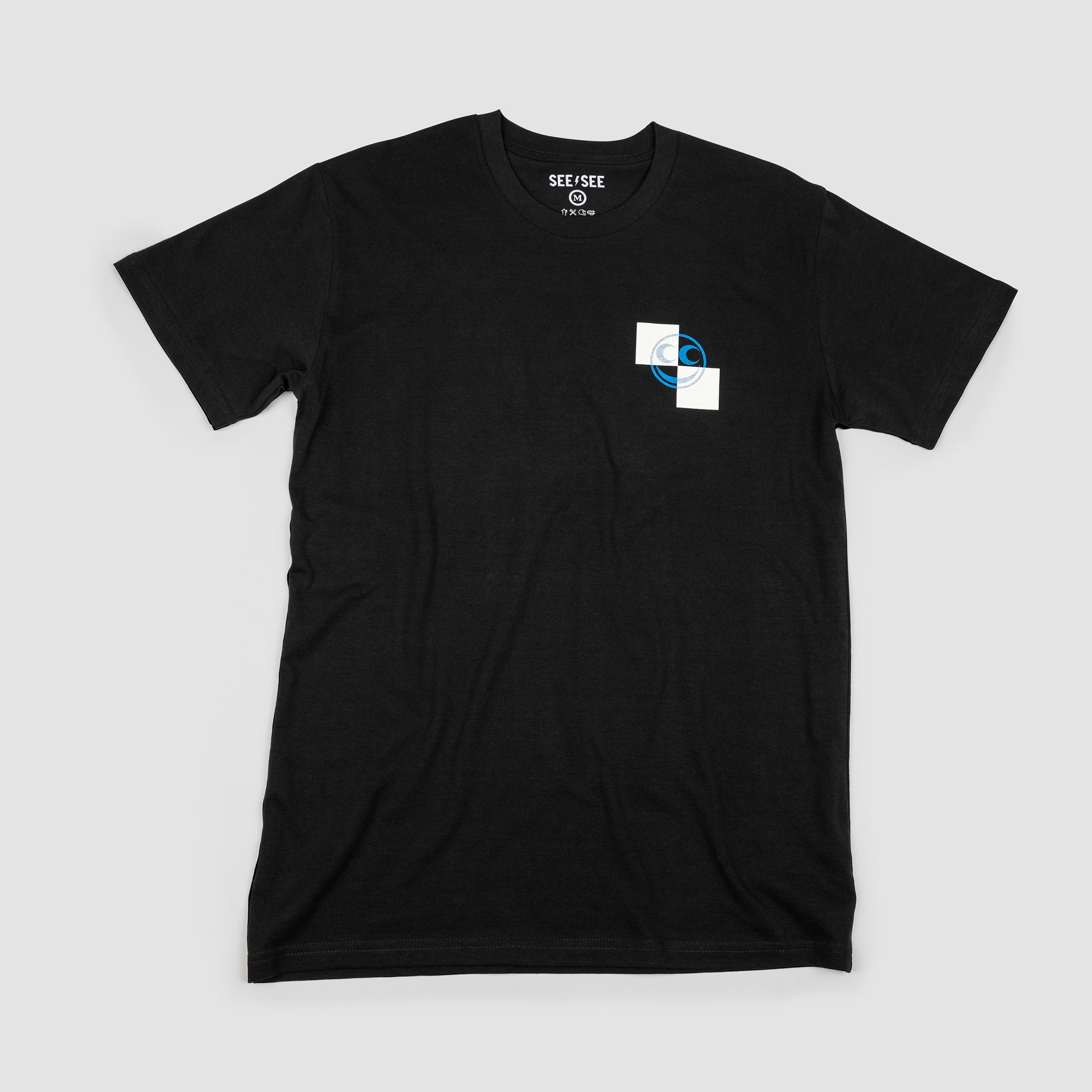 Black unisex t-shirt with white and black checkered left breast detail with blue vern smiley overlay.