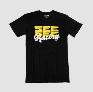 Front shot of black adult unisex t-shirt with boxy yellow See See logo design with the word racing in a white cursive overlay.