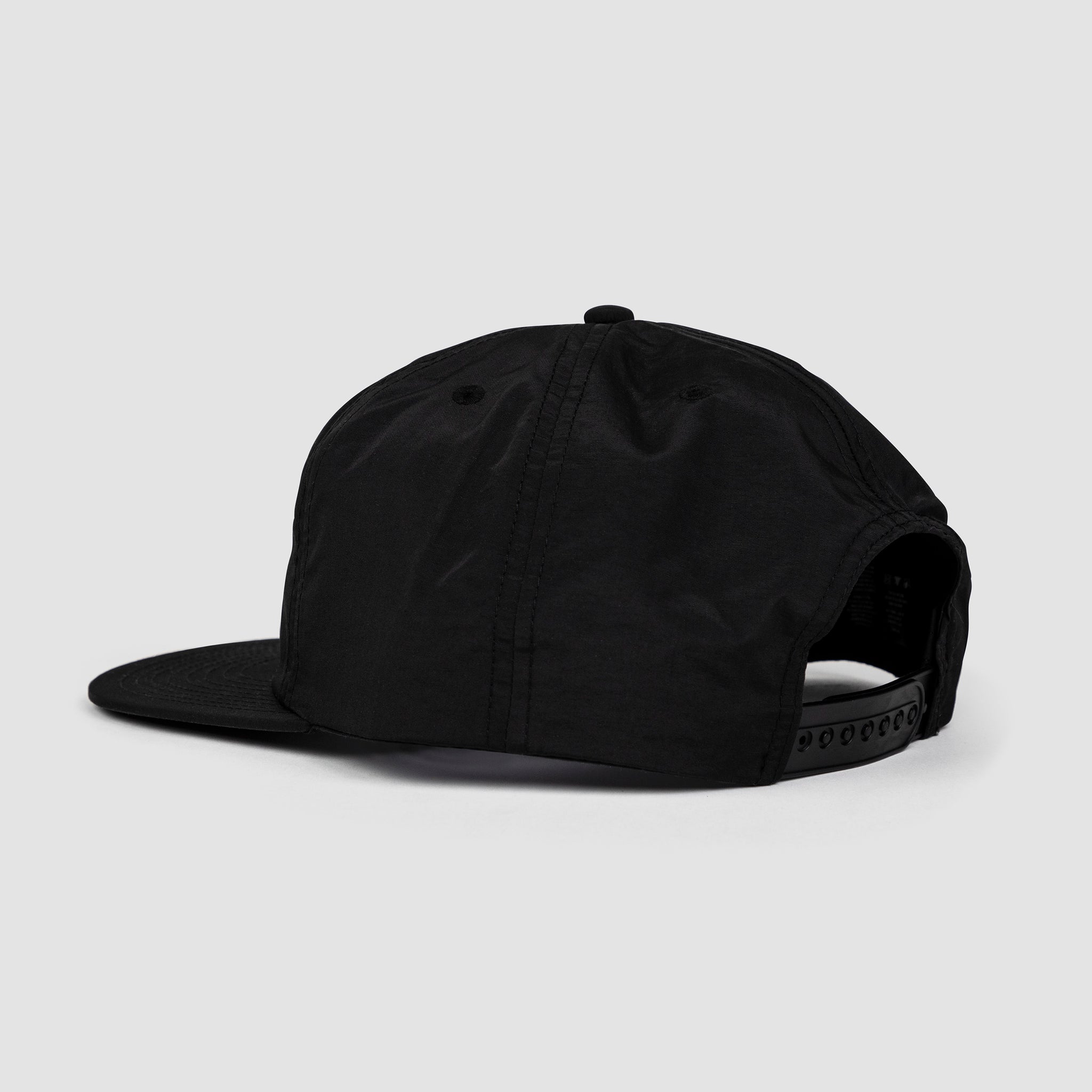 Back shot of black unisex adult surf-style 5-panel hat with adjustable snap back. 