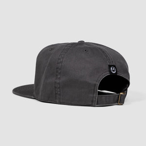 Back angle shot of dark gray cotton unisex 5-panel hat with adjustable buckle closure.